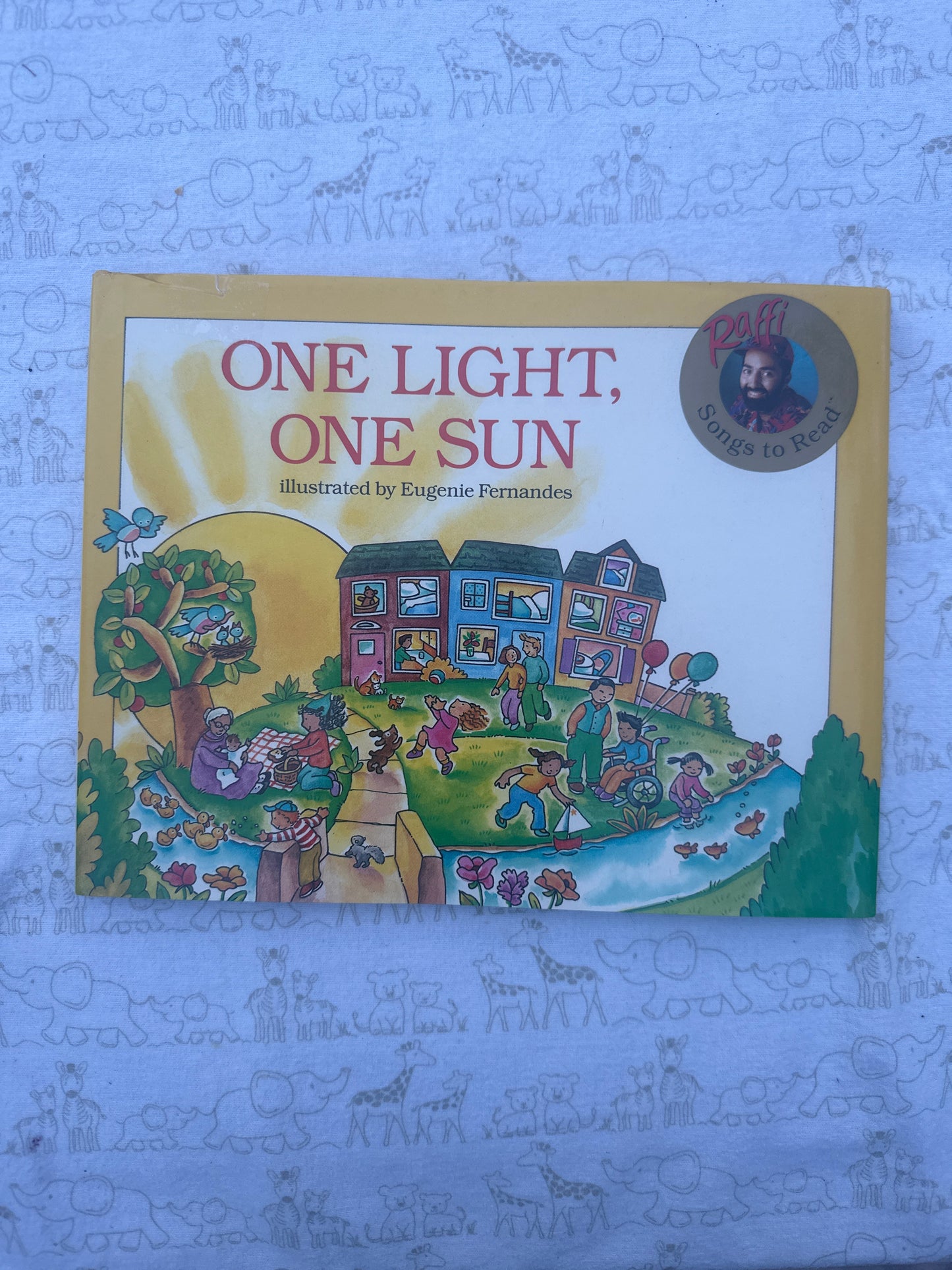One Light, One Sun (Raffi, E. Fernandes illustrator)