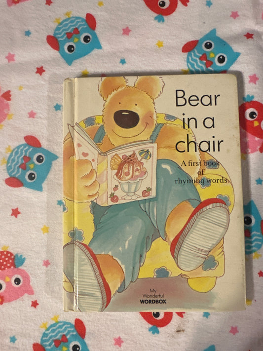 Bear in a chair